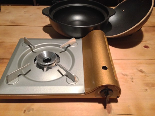 You can cook with your nabe pot on your kitchen stove or on a portable gas burner. Gas burners are fun to bring to the table and allow everyone to cook together!